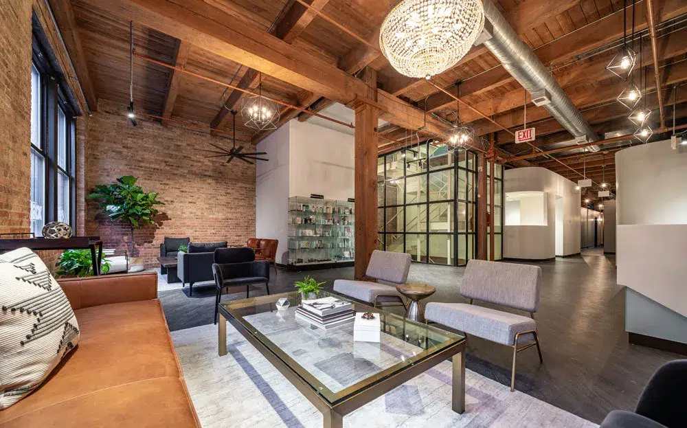 The FemSculpt practice interior in Chicago, with exposed brick and a private seating area